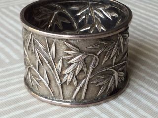 LATE 19TH CENTURY/EARLY 20TH CHINESE SILVER BAMBOO DESIGN NAPKIN RING.  1 2