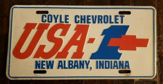 Coyle Chevroler Usa - 1 Albany,  Indiana Dealership License Plate.