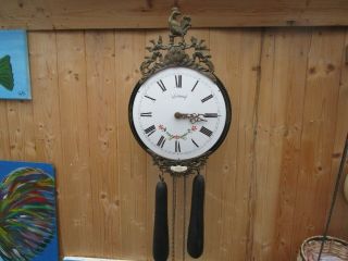 Vintage/antique Comtoise Wall Clock Of The Famous Dutch Brand Warmink.