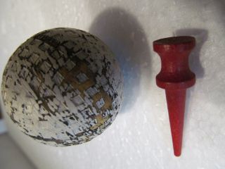 VINTAGE VACUUM CUP SQUARE MESH GOLF BALL AND A WOOD TEE BOTH CIRCA 1930 ' S 2