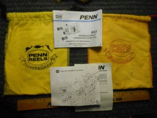 Two (2) Vintage Penn Reels International Bags And Penn 965 Paperwork