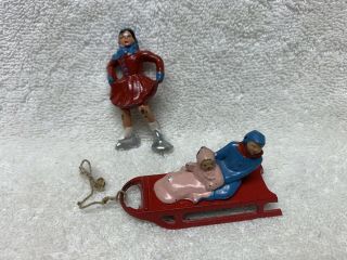 Vintage Barclay Lead Figures Ice Skater Woman & 2 Kids On A Sled