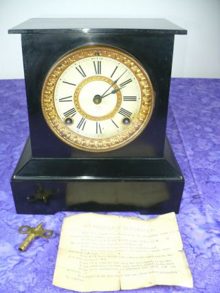 1882 Antique Cast Iron " Ansonia " Mantle Clock / Key,  Paper Collectible -