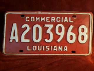 1990 Louisiana Commercial License Plate Red White