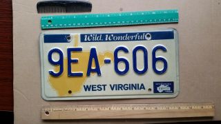 License Plate,  West Virginia,  1986,  Yellow Shape Of State,  9 Ea - 606