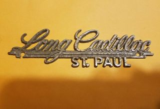 Long - - Cadillac - - St.  Pa - - Metal Dealer Emblem Car Vintage 23/38