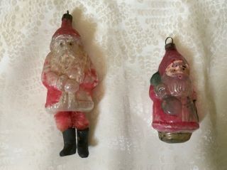 Two Antique German Santa Ornaments.  One With Legs