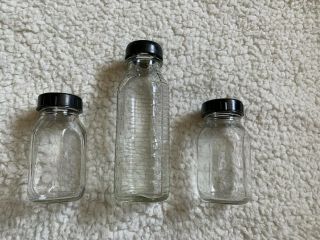 3 Vintage Glass Baby Bottles With Black Cap Evenflo Stork One 8 Oz And Two 4 Oz
