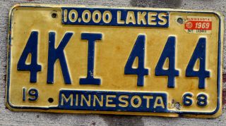 1968 Blue And White Minnesota License Plate With A 1969 Sticker