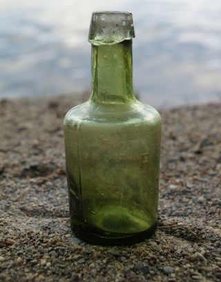 Antique Miniature Yellow - Olive Colored Open Pontil Utility Bottle