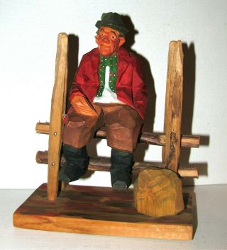 6.  Elaborate Sweden Swedish Wood Carving Hunter Sitting On Fence Signed