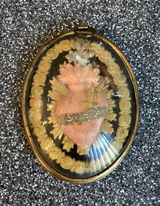 ANTIQUE EX VOTO OFF THE SACRED HEART UNDER DOMED GLASS/ FRENCH 1800’s 2.  5”x2” 2