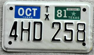 Classic Black On White Texas Motorcycle License Plate With A 1981 Sticker