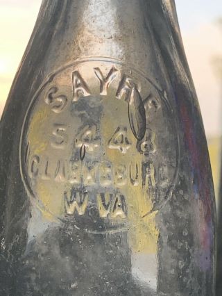 Scarce Antique Sayre 5448 Clarksburg W.  Va.  Glass Soda Bottle Round Slug Plate