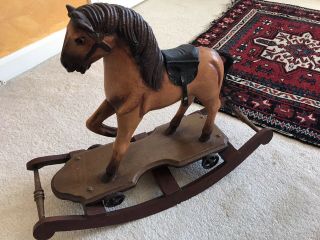 Antique Style Hand Carved Wooden Rocking Horse Pony Wheels And Leather Saddle