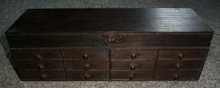 Antique Miniature Stained Pine Bank Of Twelve Drawers With Hinged Lid