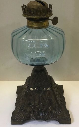 Antique ornate cast iron base oil lamp with blue glass no.  3 oil font 2