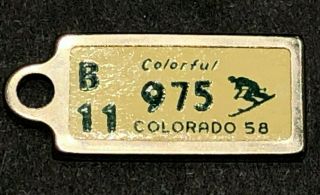 1958 Colorado Dav Mini License Plate Tag Keychain Charm Vintage Veteran Skiing