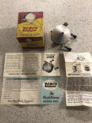 Vintage Zebco Zero Hour Bomb Co.  Reel W/ Box And Papers
