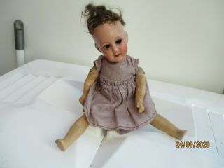 An Antique Armand Marseille Bisque Head Composition Small Doll - Open Mouth,  Teeth