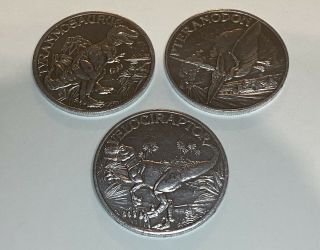 3 Vintage Age Of Dinosaurs Coins Tyrannosaurus - Pteranodon - Velociraptor