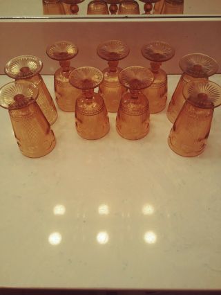 Set Of 5 Vintage Amber Indiana cut wine goblets,  and 4 footed water glass Set 2