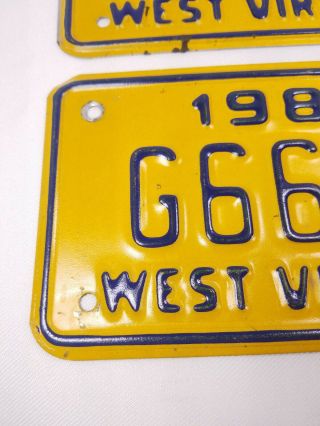 two 1980s West Virginia motorcycle bike plates 1988 1986 2