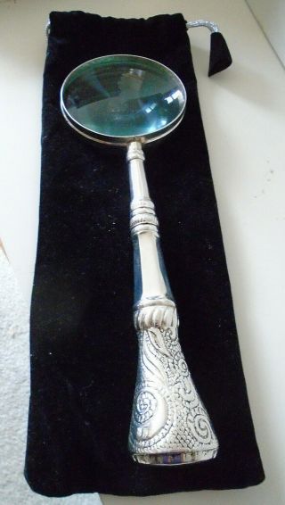 Antique Magnifying Glass - - Silver Metal Featured With An Intricate Etched Handle