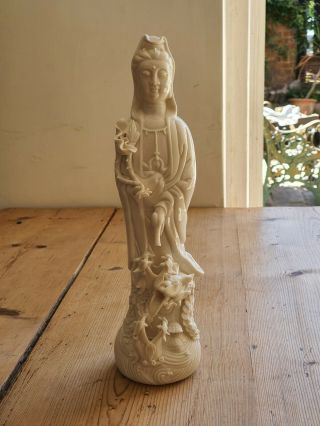 A Chinese Blanc De Chine Porcelain Figure Of Guanyin