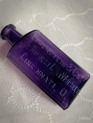 Antique Deep Purple Lowenstein & Co.  Cincinnati Ohio Whiskey Bottle Embossed