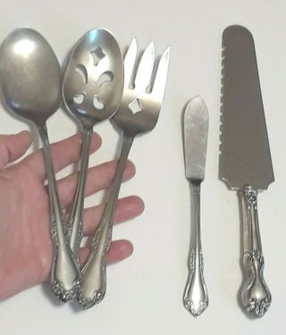 WM A Rogers deluxe stainless Oneida Flatware salad serving fork,  spoon,  knife 2