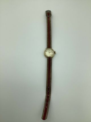 A Vintage 9ct Gold Swiss Made Tissot Ladies Wind Up Wristwatch.