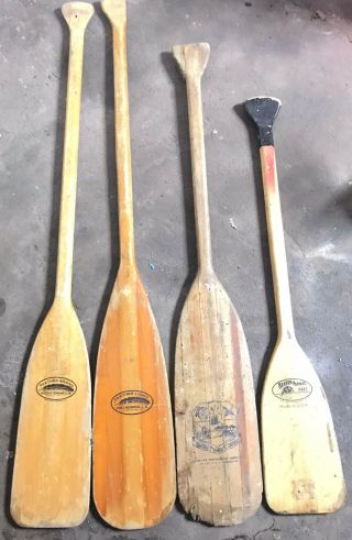 (4) Wooden Paddles (2) Caviness Feather Brand (1) Beaver (1) Antique