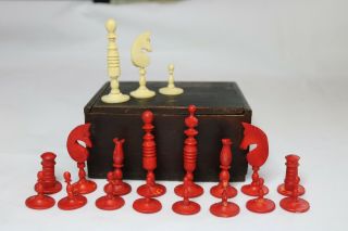 Antique Carved Red And Ivory Colored Chess Set With Wooden Box