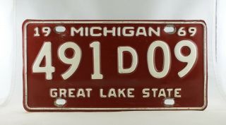1969 Michigan Dealer License Plate - 491d09 - Very Good,  Road Worn