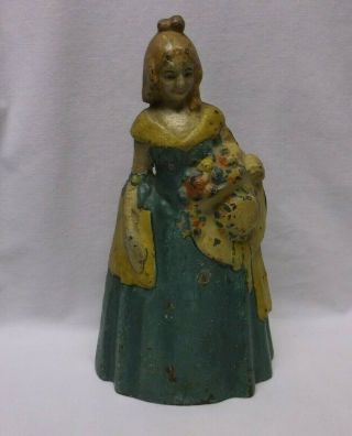 Antique Lady With Bonnet And Flowers Door Stop