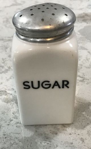 Vintage Square Sugar Shaker Milk Glass Black Print Mckee?