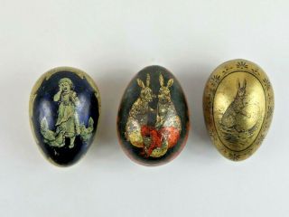Three Antique Tin Lithograph Easter Egg Shaped Candy Containers