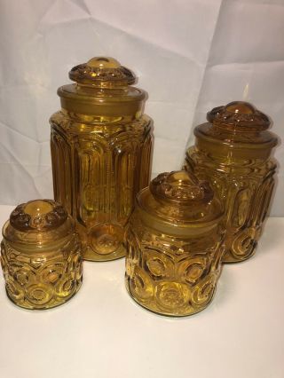 Vintage L.  E.  Smith Moon & Stars Amber Glass Canister Apothecary Jar Set Of 4