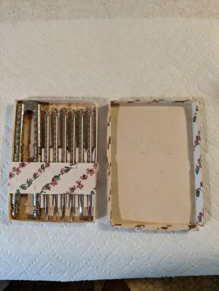 Vintage Hmq Steel Set Of Nut Cracker And 6 Picks