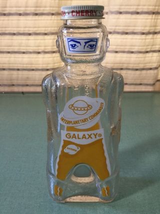 Vintage 50s Galaxy Syrup Interplanetary Commander Bottle Bank Black Cherry