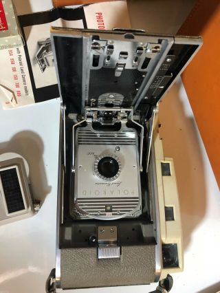 Vintage Polaroid The 800 Land Camera With Leather Case,  Manuals,  Flash,  And More