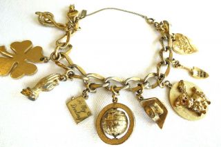 Vintage Monet Charm Bracelet Gold Tone 9 Charms Nurses Cap Poodle Hk