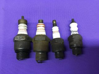 4 Vintage Sparkplugs - 3 Champion 1 Firestone
