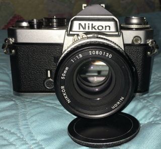 Vintage Nikon Fe 35mm Slr Camera With Nikkor 50mm F/1.  8