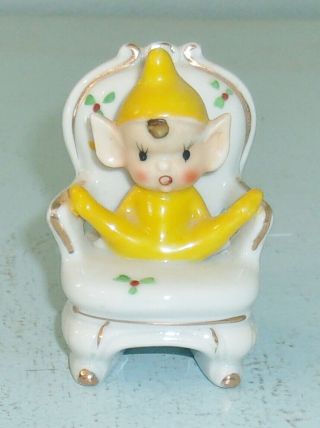 Vintage Porcelain Pixie Elf Figurine Sitting In Chair Yellow