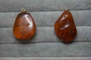2 Vintage Amber Pendants,  One With A Gold Mount