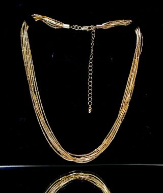 Vintage Multi Strand Gold Tone Metal Chain Necklace.