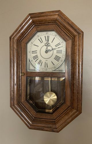 Vintage Howard Miller Chiming Wall Clock Pendulum Striking Solid Oak Case
