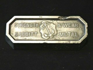 Babbitt Metal 4 1/2 Lbs Vintage Advertising Paperweight Strength & Wear W/anchor